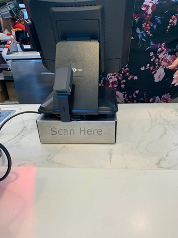 Register Stand with 'Scan Here'